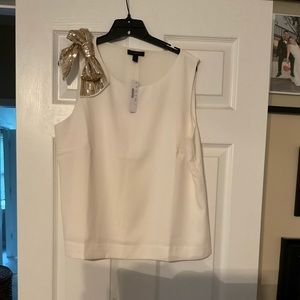 J Crew sleeveless top size 14 with sequin bow.